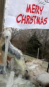 Ice-covered dog statue